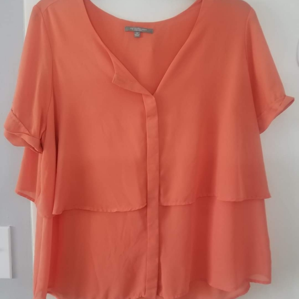 Orange ruffle blouse